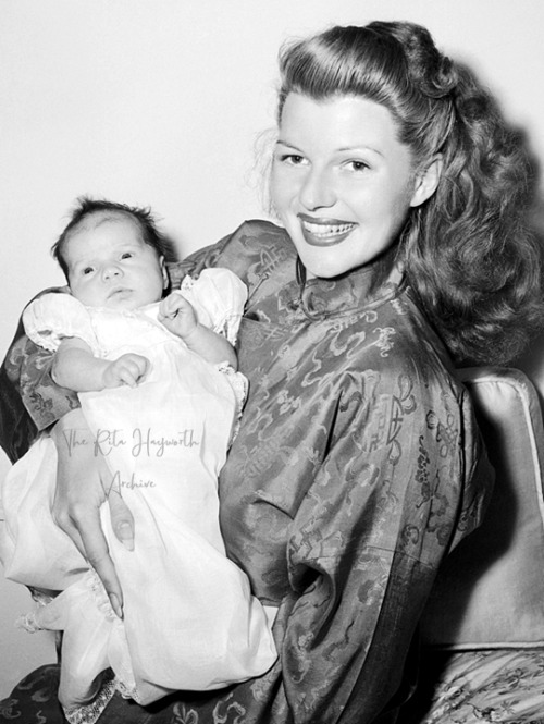 theritahaywortharchive:Rita Hayworth and her newborn baby daughter Rebecca Welles, 1945