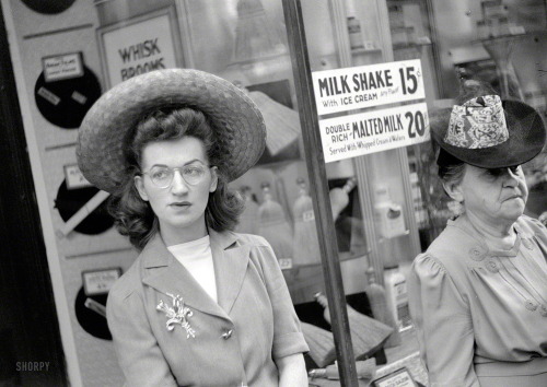 vintage-every-day:July 1941 in Chicago: Waiting for a streetcar. 35mm nitrate negative by John Vacho