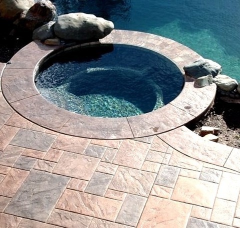Sacramento PoolLarge Tuscan Backyard Concrete Paver And Round Hot Tub Photo