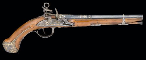 Chisled and gold inlaid Spanish flintlock pistol crafted by Miguel Zeggara of Madrid, circa 1776,
