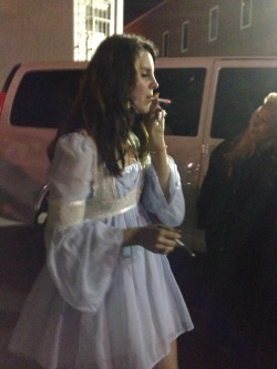 virgindepp:  dollydelta:  buh-randon:  Okay last one. But look how cute she is smoking a ciggy  Favorite Lana dress  