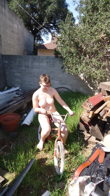 Porn Pics naturistelyon:  Bicycle in the backyard 