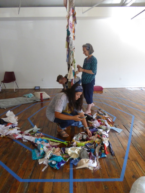 Katrina, Vicky and Shelby adding their dreams to the Dream Scroll. Photo credit Shawna Caldwell