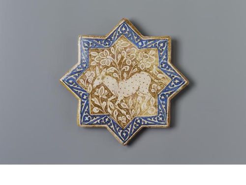 A lustre pottery star Tile, Persia, circa AD 1310