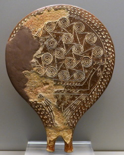 ancientart:  A selection of Early Cycladic II ‘frying pans’ from the cemetery of Chalandriani, Syros. All date to about 2800-2300 BCE. The 1st ‘frying pan’ shows an incised representation of a paddled longboat set among stamped wave-like spirals.