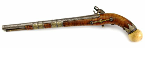 A gold inlaid miquelet pistol with ivory butt.  Originates from the Caucuses, early 19th century.