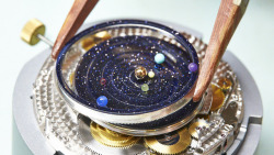 voodoomooncakes:  seraphica:  The Midnight Planétarium from the Poetic Astronomy series - a gorgeous (and accurate) timepiece that tracks the planets in the sky. Fair warning, though - the standard version will run you 趖,000. [x]  趖,000. 趖,000.