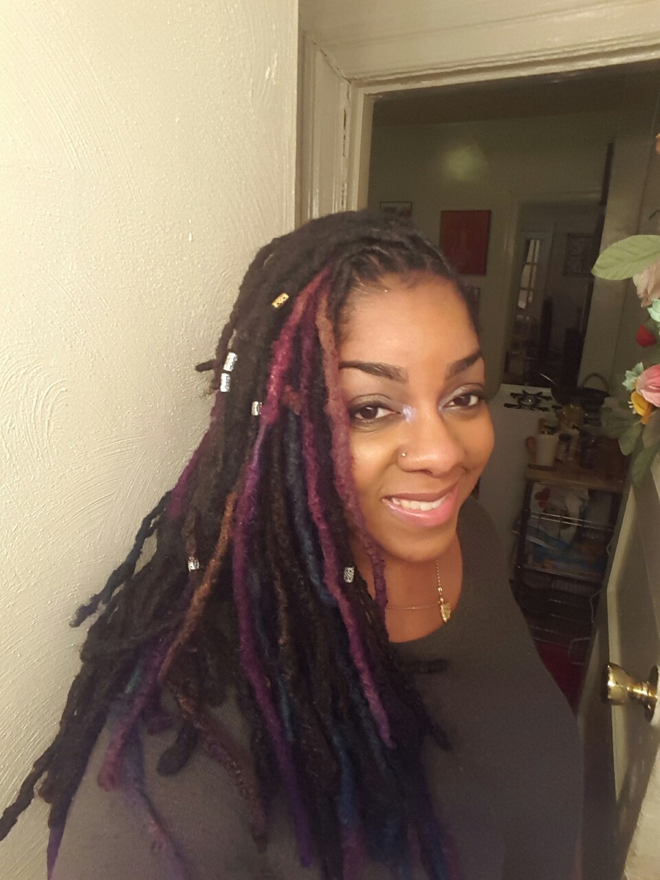 dynastylnoire:  My first move of 2k16 was taking the yarn off my locs and getting