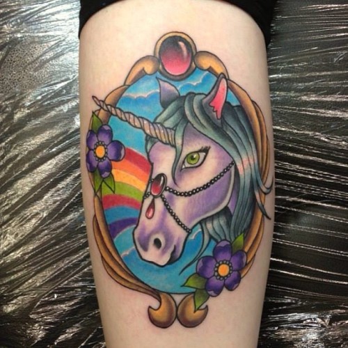Unicorn tattoo done today on...