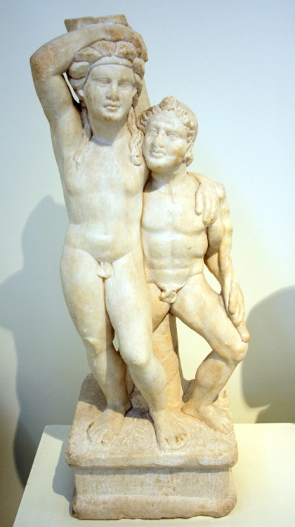 A table support in the form of the drunken Dionysus and a satyr.  Artist unknown; produced in Attica