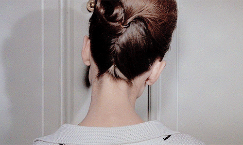 hepburny:Close-up shot of Audrey Hepburn’s updo in Paris When It Sizzles (1964) by hair department s