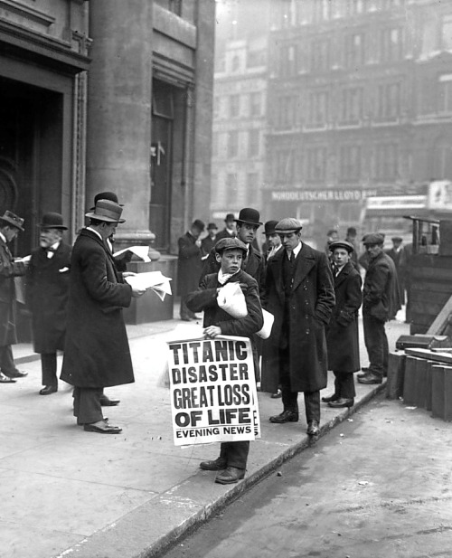 its-rmstitanic: Ned Parfett, paperboy, outside the London White Star Line offices, April 16, 1912, f