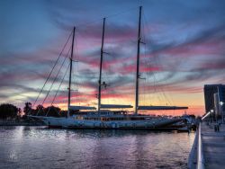 lancevaughn:Athena 002 The super-yacht Athena is silhouetted against the blue, purple, pink and orange hues of the sunset over San Diego Bay. http://lance-vaughn.artistwebsites.com