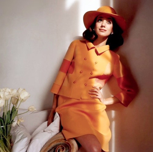 Marisa Berenson in a orange suit by italian designer Mila Schön, photo by Henry Clarke for Vogu