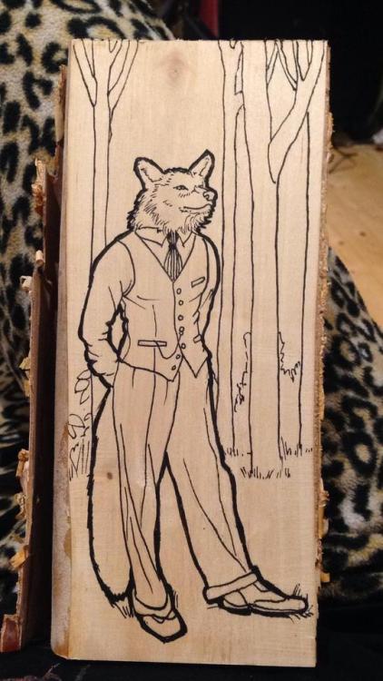 theseavoices:A 1940′s werewolf on birch with ink and resin. He is shiny!