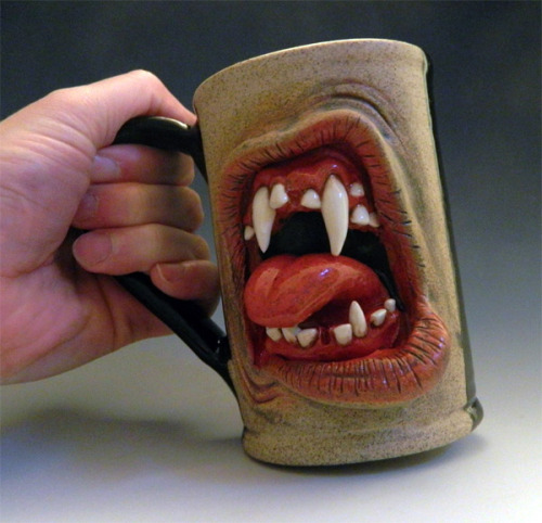 welcome-foolishmortals:  These monstrous stoneware mugs are the work of folk artist Ron Free and his Big Duluth Creative Studio located in Carrollton, Georgia. Visit Ron’s Facebook page to view more of his awesome creations. [via 