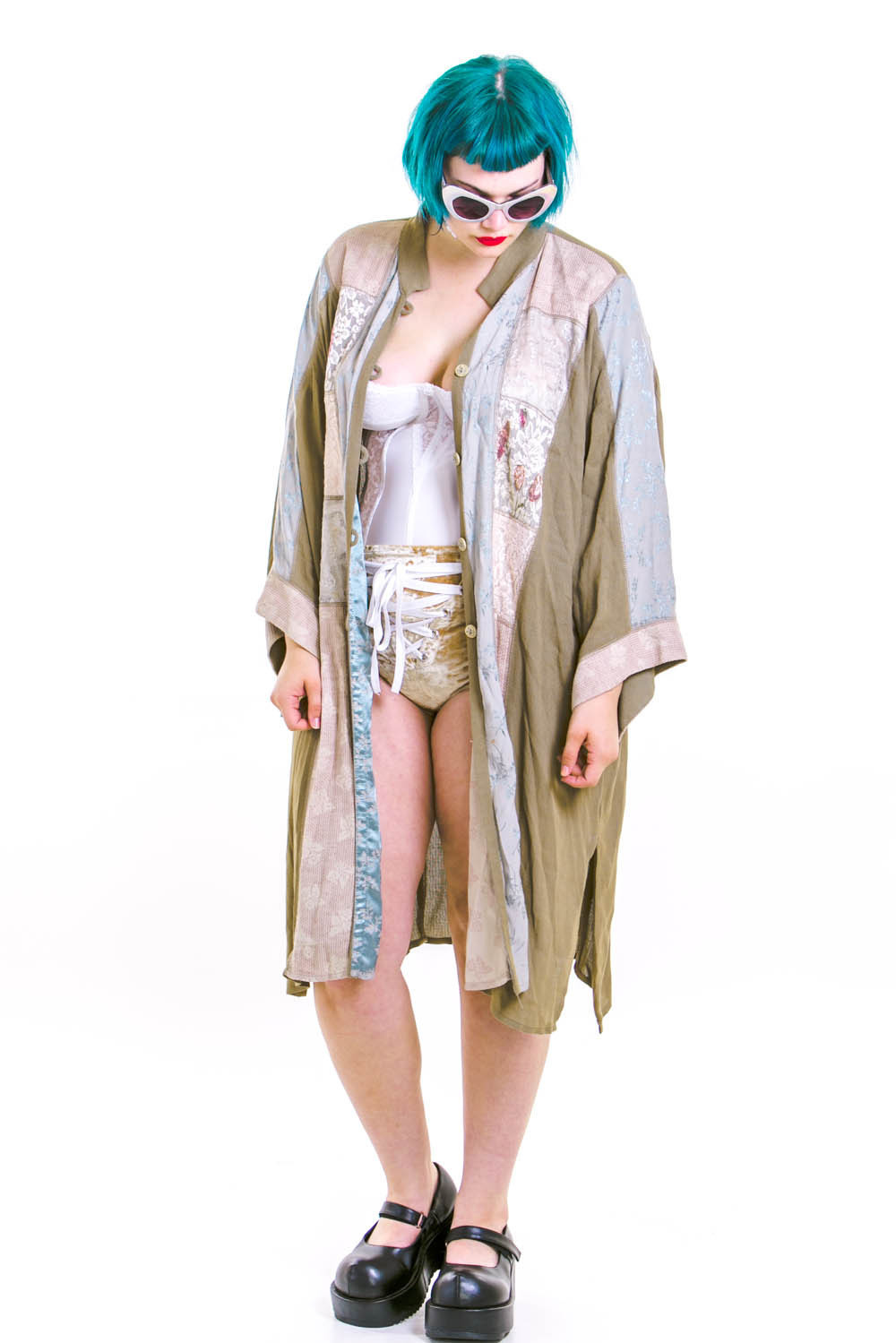 killerkurves:  Isabel Hendrix (5’10”, 38-33-47) in dusty-sage-jacket