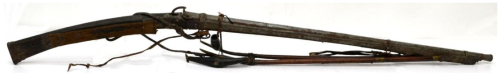 16th or 17th century Tibetan matchlock musket with bipod rest.