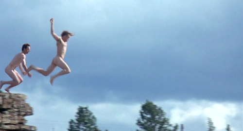 Jake Gyllenhaal and Heath Ledger jump into the Bow River, east of Canmore, Alberta, in a scene from 