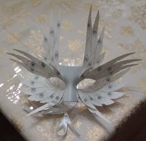 My Halloween angel costume. The wing is made from craft foam, flight feathers and secondaries cut ou