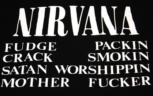 nirvananews:  From an August, 1989 interview with Kurt Cobain from ‘NME’ magazine:  Hottest item this summer has to be the official Nirvana T-shirt with the band’s logo emblazoned over what looks like a set of tree rings or perhaps a detailed cross