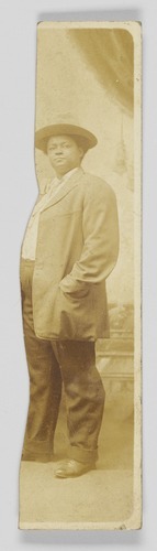 si-african-american-history:Piece of a photographic postcard of an unidentified woman in a jacket and pants, 1904-1918, Smithsonian: National Museum of African American History and CultureSize: H x W (Image): 5 ¼ × 1 3/16 in. (13.3 × 3 cm)Medium: silver