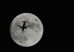 suspend:  Plane Moon by pentlandpirate on