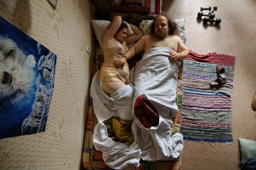  Jana Romanova a Russian photographer captures couples in their sleep to explore their cultural attitude inside their families. Since she didn’t want them to pose she had to stick around their house till they fall asleep deeply and she would take the