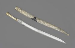 art-of-swords:  Yatagan with Scabbard Artist / Maker: unknown Culture: Ottoman Dated: late 17th century (blade); late 18th century (mounts); 18th century (scabbard) Medium: steel, gold, silver, wood and leather, chiselled and embossed Measurements: blade
