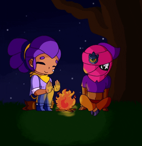 Cute girlfriends having a good time around a campfire. ♥