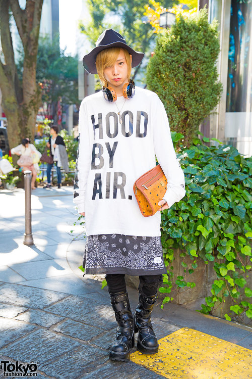 tokyo-fashion:  20-year-old Kenchu in Harajuku wearing a Hood By Air top with a bandana skirt, ripped jeans, studded boots, and clutch/headphones by MCM. Full Look