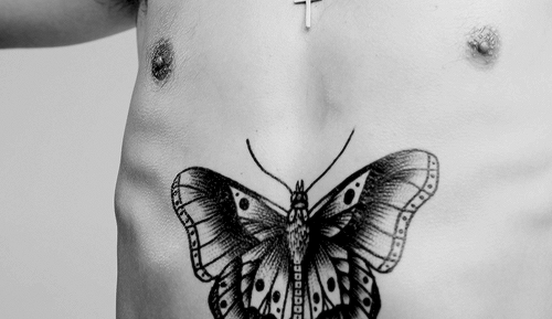 worldstyles: “The butterfly on his torso is based on and old French prison tattoo