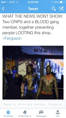 little-parenthesisineternity:  Honestly one of the most interesting and awesome things I have ever seen in my life. When a community stands together, the FULL community stands together. God Bless Ferguson. 