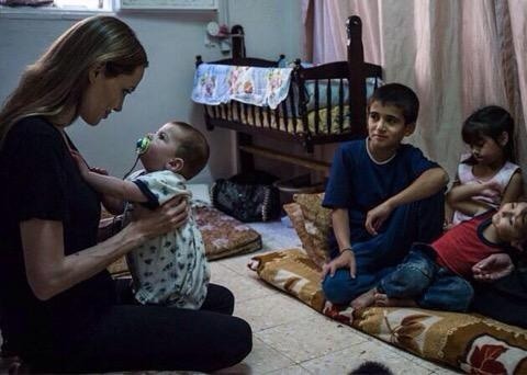 tyrabankruptcy:phoebeard: xbat-girlx:       Angelina Jolie and Brad Pitt are adopting a two year old Syrian boy named Moussa who lost both his parents. Angelina stated that part of the reason for the adoption is to bring awareness to what is happening