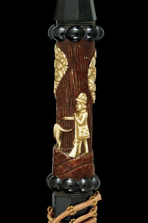 A wonderfully carved tobacco pipe originating from 19th century Germany.