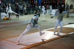 modernfencing:  [ID: a foilist lunging as