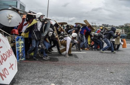 npr: While President Nicolas Maduro has set the gears in motion for a new Venezuelan constitution, the confusion and violence that has engulfed city streets for more than a month only appears to be deepening. The tumult continued apace this week, opening