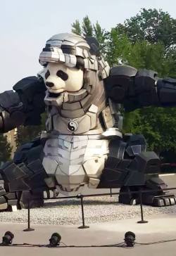 sixpenceee:   Iron Panda statue in China