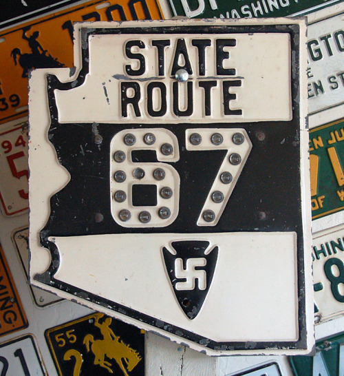 Two original Arizona state route signs. These ran from the late 1920s until around 1940. SR 67, is t