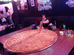 kickingassand-takingnames:  brown-eyed-hijabi:  kingofhispaniola:  Who needs a man  When you can have a slice of pizza the size of a man  Any pizza is a personal pan pizza if you believe in yourself hard enough. 