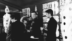 lovelytomlinsn:  One Direction (Louis) attempt to steal their own Brit Award at the 2013 Winner’s Conference (c) 