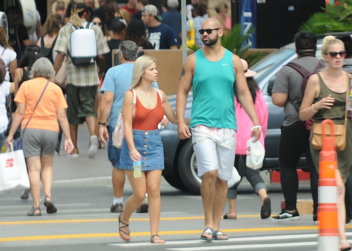 Saw her side boobie from way down the street.