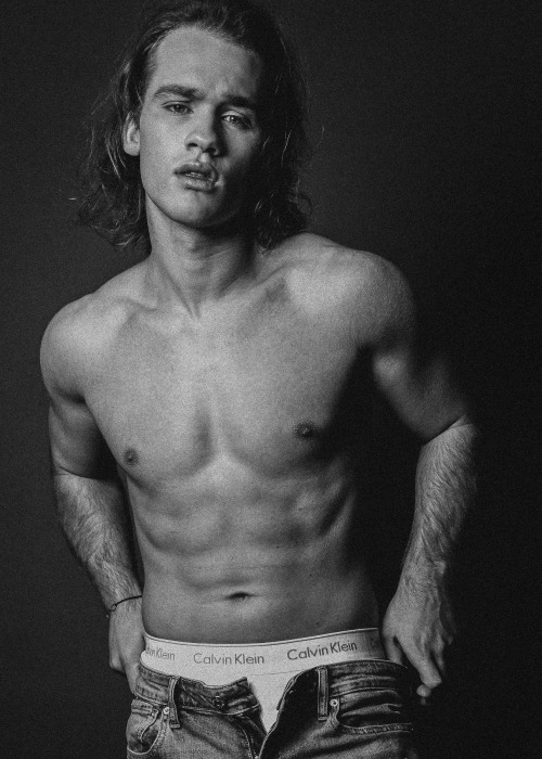 vogueman:  Charlie Distefano photographed by Connor Clayton for Vigour Magazine, December 2022. Charlie wears jeans and underwear by Calvin Klein