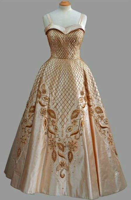 ephemeral-elegance:Beaded Satin Evening Gown, 1957Designed by Norman Hartnell Won by Queen Elizabeth