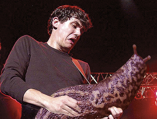 Someone started a Tumblr blog called Slug Solos with photos of musicians rocking out that have had their guitars replaced with giant slugs.