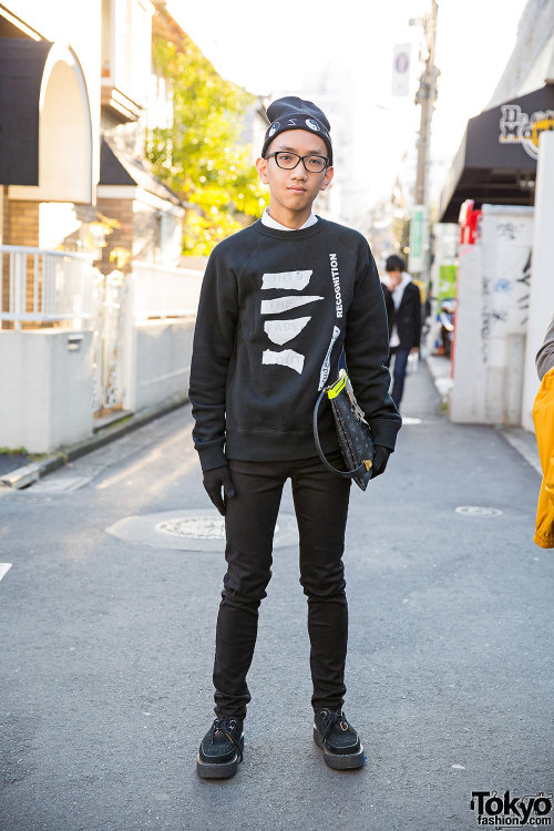 17-year-old Sean on the street in Harajuku wearing a Project sweatshirt with skinny jeans, George Co