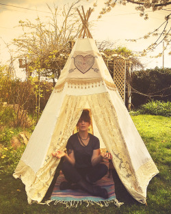 fancyclancytees:  I made a teepee out of 2 old drapes, a table cloth and 6 bamboo poles. Pretty pleased with my fort!  