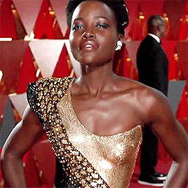 calebholoways:Actress Lupita Nyong’o arrives at the red carpet for the 90th Annual Academy Awards on