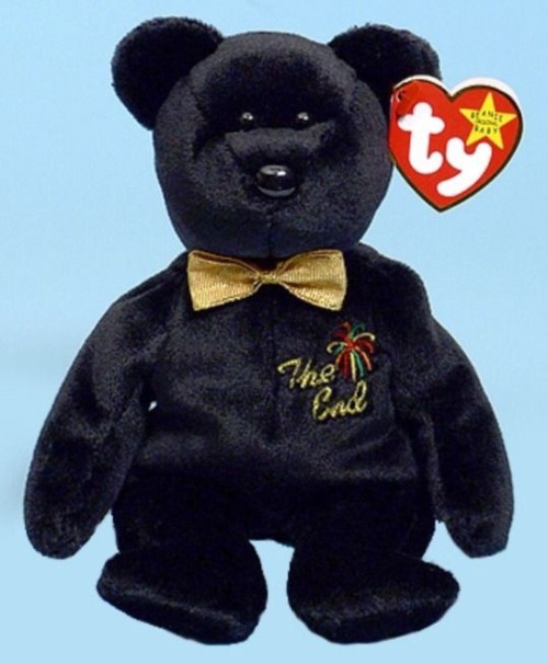 a black bear with a golden bowtie and the words "The End" embroidered on it's chest.
