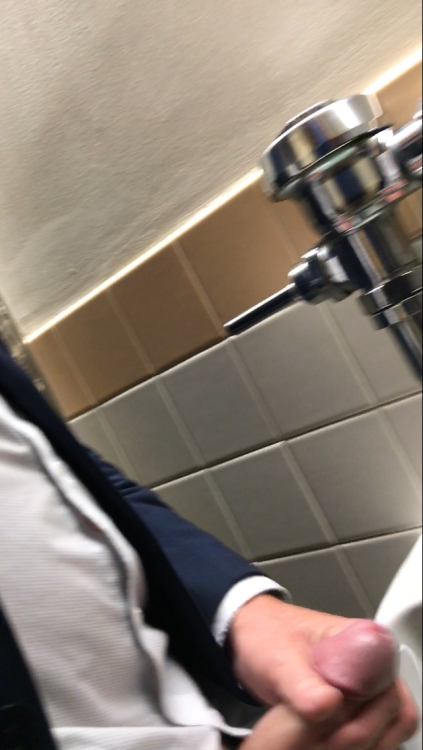 hobartgloryhunter:  gloryholecam:Don’t know why this didn’t post the 1st time. Super hot, bearded, suited, hairy, tatted and lean guy. Jerking it at the urinals. Said no to me blowing at first but as soon as he weakened I jumped down there and he